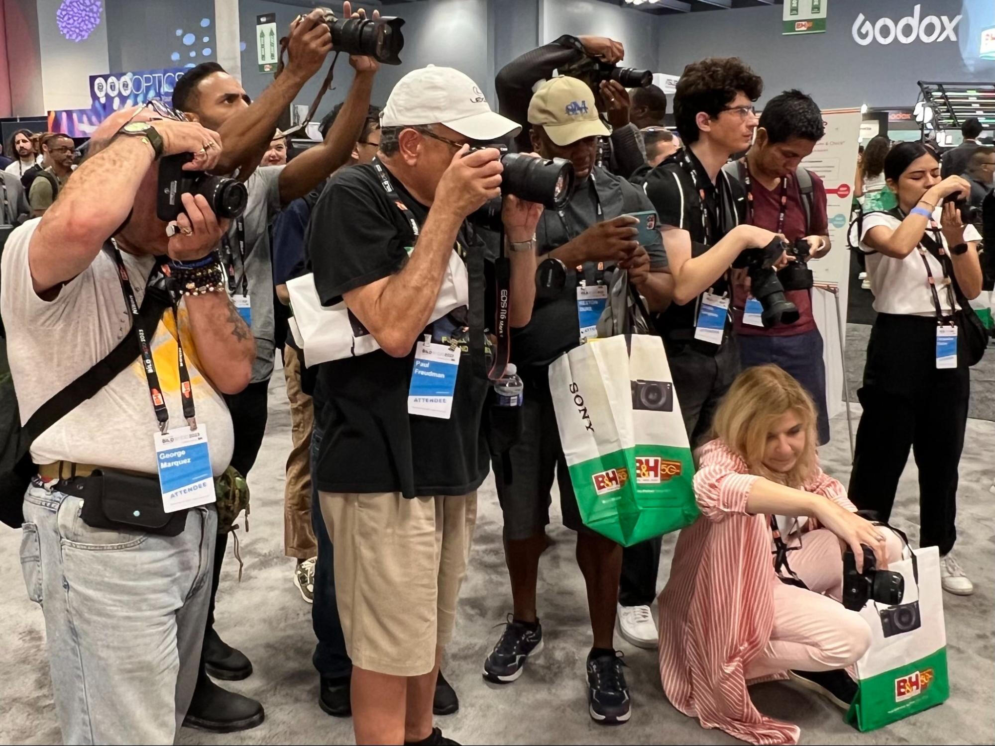 photographer taking a photo of a model